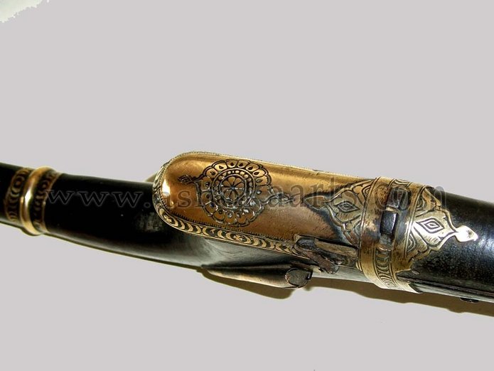 Large Antique Matchlock musket from Sind with gilt mounts and damascus twist barrel